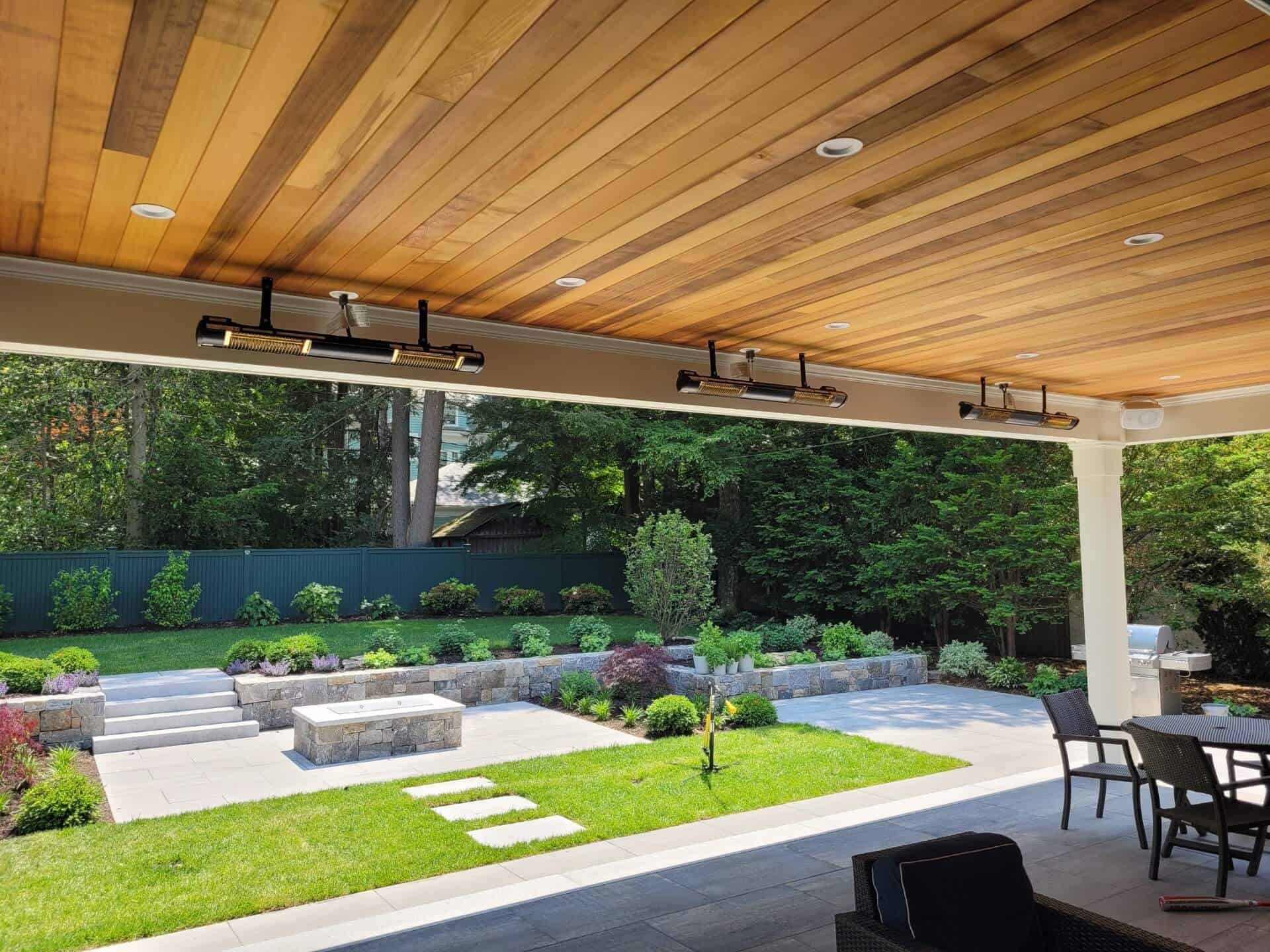 Solaira Outdoor ceiling-mounted heaters under a covered deck in Boston