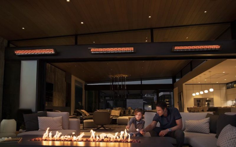 Infratech CD Series Heaters wall-mounted in a residential indoor/outdoor patio