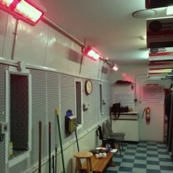 Solaira Alpha H2 heater wall mounted at indoor shooting range