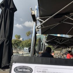 Solaira CosyAW H1 heater installed on restaurant umbrella (Yard House, Long Beach, CA)