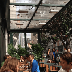 Suspended Solaira Alpha H1 outdoor heaters on restaurant patio