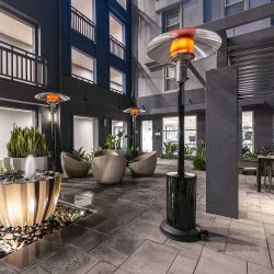 Sunglo A270 Propane Gas, Free-Standing outdoor commercial grade heater in a hotel patio area
