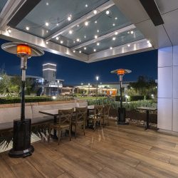 Sunglo A270 portable gas powered heater in a patio lounge